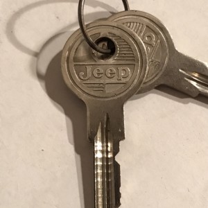 Jeep logo glove box key