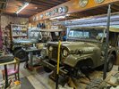 Both m38A1s in garage resized.jpg